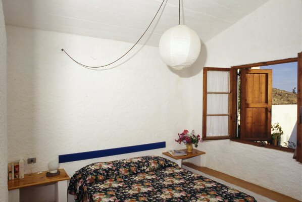 Camera da letto di una casa di Asprochori
